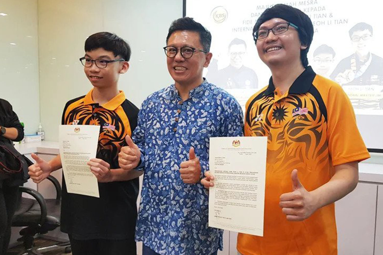 Young Malaysian chess champions return to praise and recognition